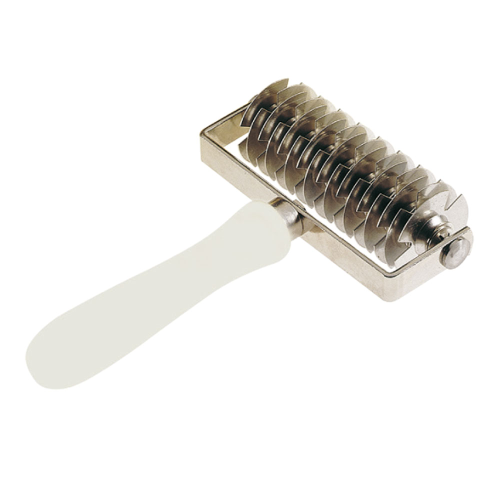 Rouleau pour confectionner des grillages en pâte